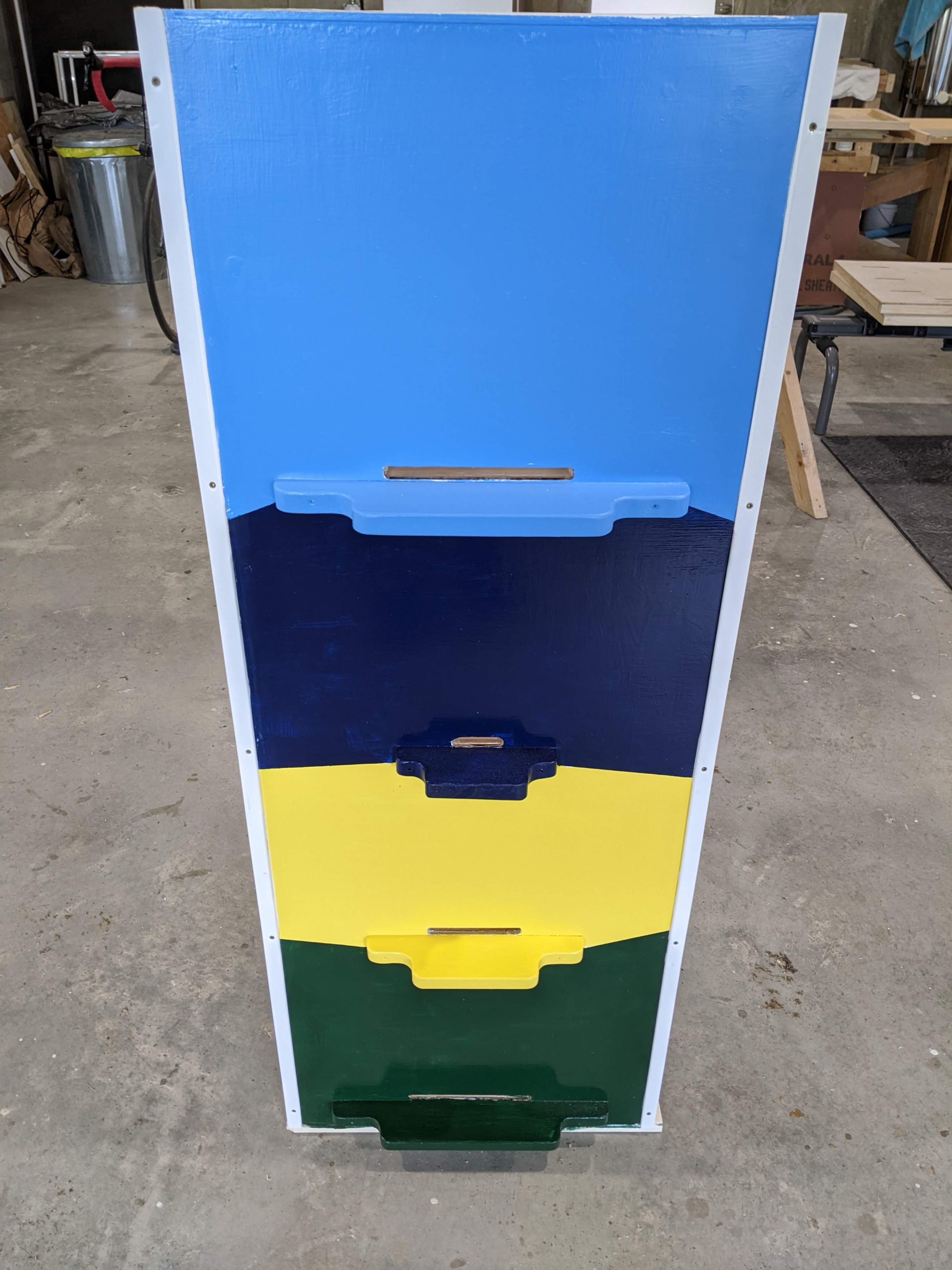AZ hive painted front with landing boards