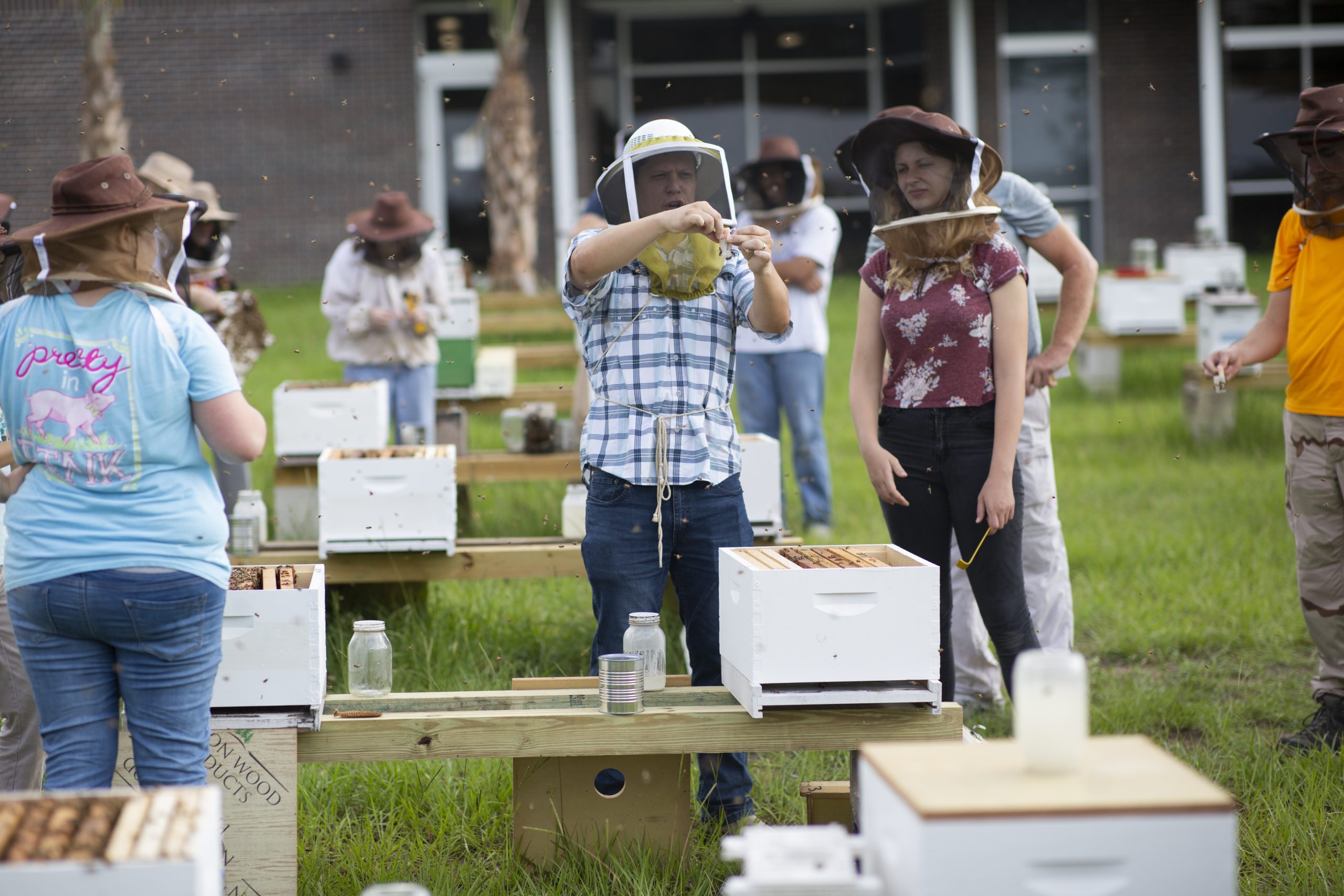 Figure 3. Cameron teaching a group of undergraduate students in his Practical Beekeeping course. Photo: Tyler Jones, University of Florida